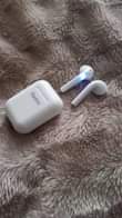 A picture of Bluetooth airpods Og 15000 tu call 0624 088 380