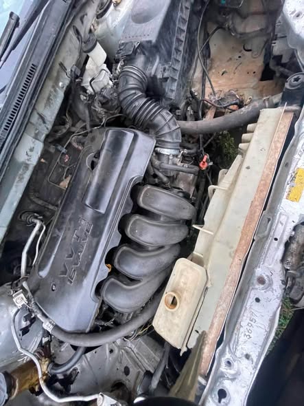 A picture of 06 Toyota Corolla with sharp engine gear buy and drive