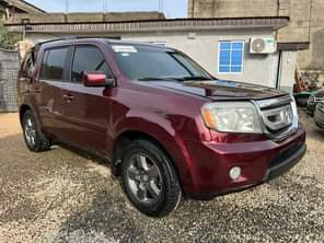 A picture of Brand Honda Model Pilot Year 2011 A C cooling Price