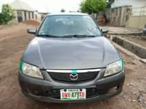 A picture of Mazda FIRSTBODY Price 490k Dm or Call 09068030011 Beautiful in