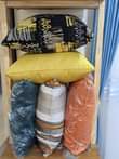 A picture of Curtains nets pipes and cushions
