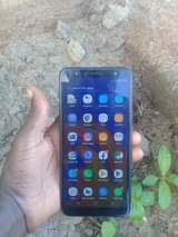 A picture of Samsung galaxy j4 core imenyook ukung kwa mbal camera ya