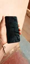A picture of Infinix hot 7 has some cracks but fully functional