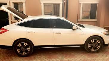 A picture of CLEAN DEAL TOKS STANDARD 2014 Honda crosstour Registered 2014 tomstat