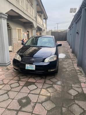 A picture of Toyota Corolla 2004 5 neatly flashed on first body everything