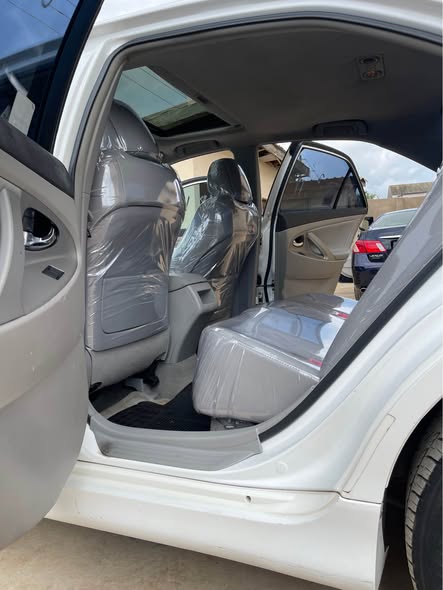A picture of DIRECT TOKUNBO EXQUISITE CLEAN CAMRY SPORT 2009 MODEL JUNE 2026