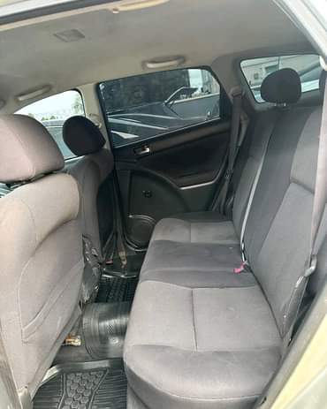 A picture of Toks standard..sharp with android screen and reverse camera 2004 Matrix