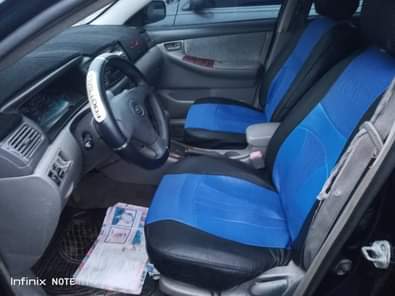 A picture of Toyota Corolla with sound engine and gear location is uyo