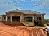 A picture of Wakiso Banda house with four boysquarters Having 5 beedrooms sitting