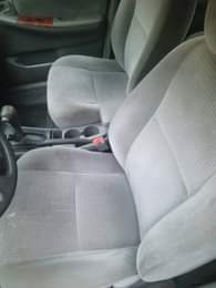 A picture of 2006 Corolla Engine has tapping sound Body sharp and straight