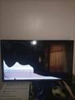A picture of Hisense flameless 32 with a broken screen at 200 000