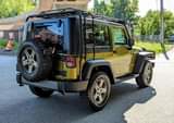 A picture of 2010 Jeep Wrangler Sport SUV 2D Mountain PKG.
