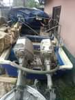 A picture of This fibre boat with the double engine 27 horsepower for