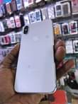 A picture of iPhone X 256gb storage Working Face ID 100 battery health