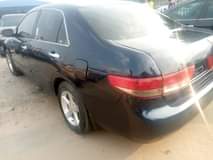 A picture of Sharp Honda Accord EOD 2004 Fabric interior Untouched silent engine