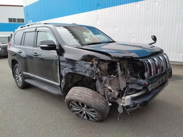 A picture of DAMAGED TOYOTA LAND CRUISER PRADO READY TO BE IMPORTED UGX