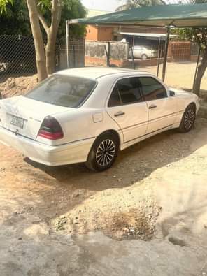 A picture of EXCELLENT SMOOTH DRIVE Unregistered first body Mercedes Benz Kompressor red