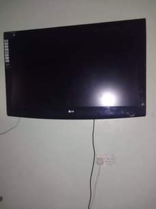 A picture of Tv lg 43 radio old model panasonic and clubox woofer