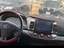 A picture of 2005 neatly used Toyota Camry with Android reverse camera