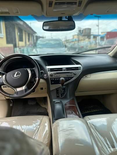 A picture of Tokunbo Lexus RX350 2015 model Clean leather interior Sound V6