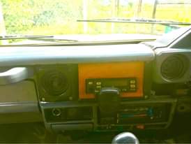 A picture of Land Cruser War Bus