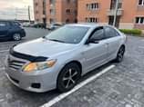 A picture of This is Camry 2010 model partly painted 4 plugs venza