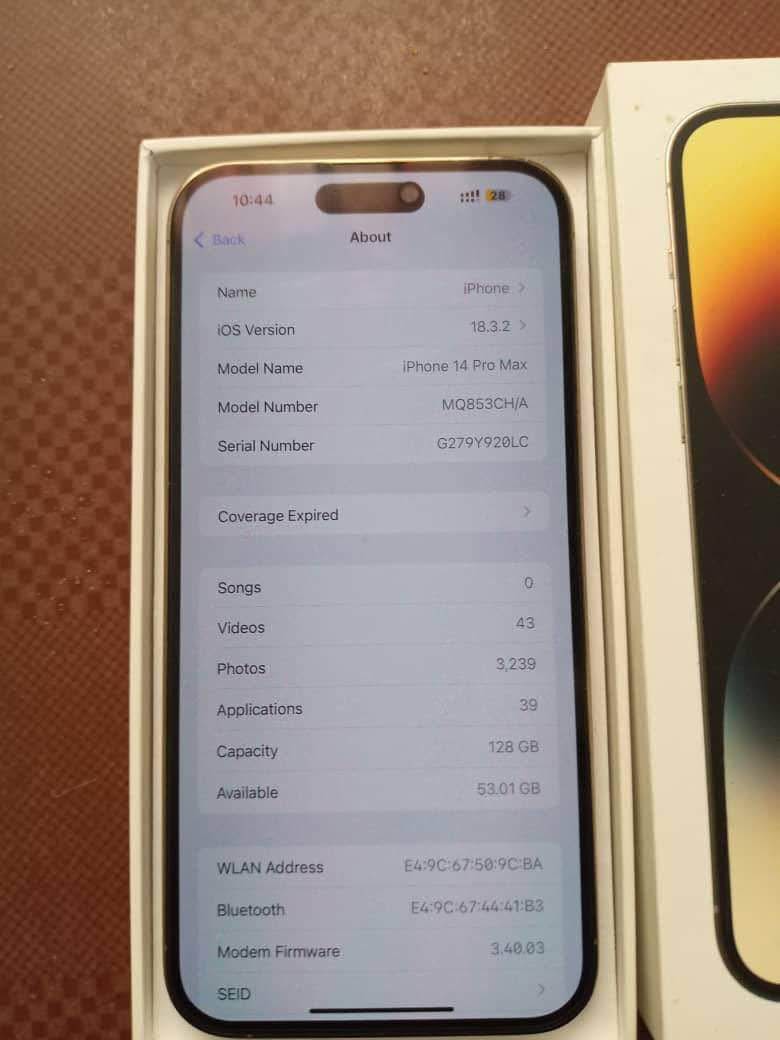 A picture of Iphone 14 pro max With cartoon no replacement part Very