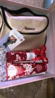 A picture of Gift hampers and fresh flowers