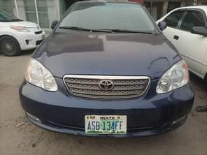 A picture of Belgium Standard 2004 Model Toyota Corolla First flash on first