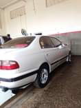 A picture of 1998 Toyota corona St 191 Peal white