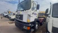 A picture of Foreign used man diesel truck 10 tyres with tunnel axel