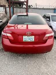 A picture of RED Neatly used ND registered Toyota Camry LE 2008 model