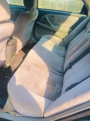 A picture of Toyota Camry tiny light Engine ok Gear ok Body needs