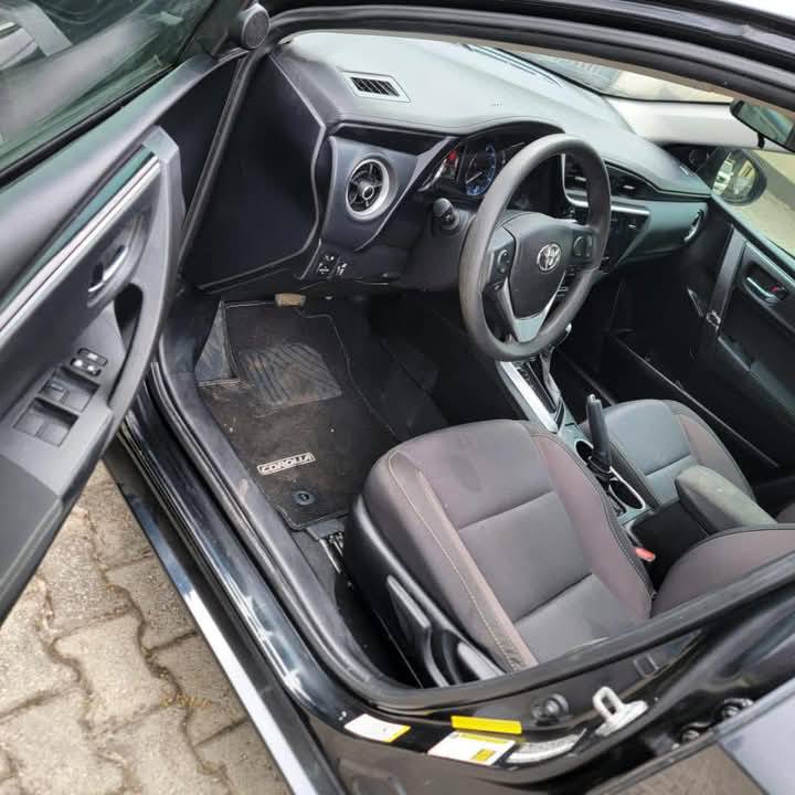 A picture of DIRECT TOKUNBO 2018 TOYOTA COROLLA Extremely clean interior and Exterior