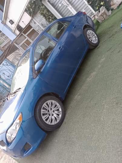 A picture of 2010 registered Toyota corolla Very clear fish on first body