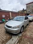 A picture of 2004 Toyota Camry XLE 4plugs Engine Extremely clean in and