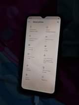 A picture of New Phone and few months used bed