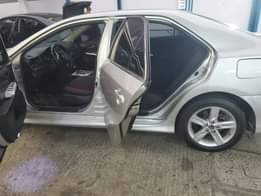 A picture of Toyota Camry LE 2006 model Factory paint 4 plugs untermpered