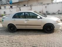 A picture of Corolla sport 2003 engine smokes