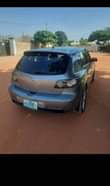 A picture of Mazda3 2005 model going vfor 1 450M Location Abuja Lugbe