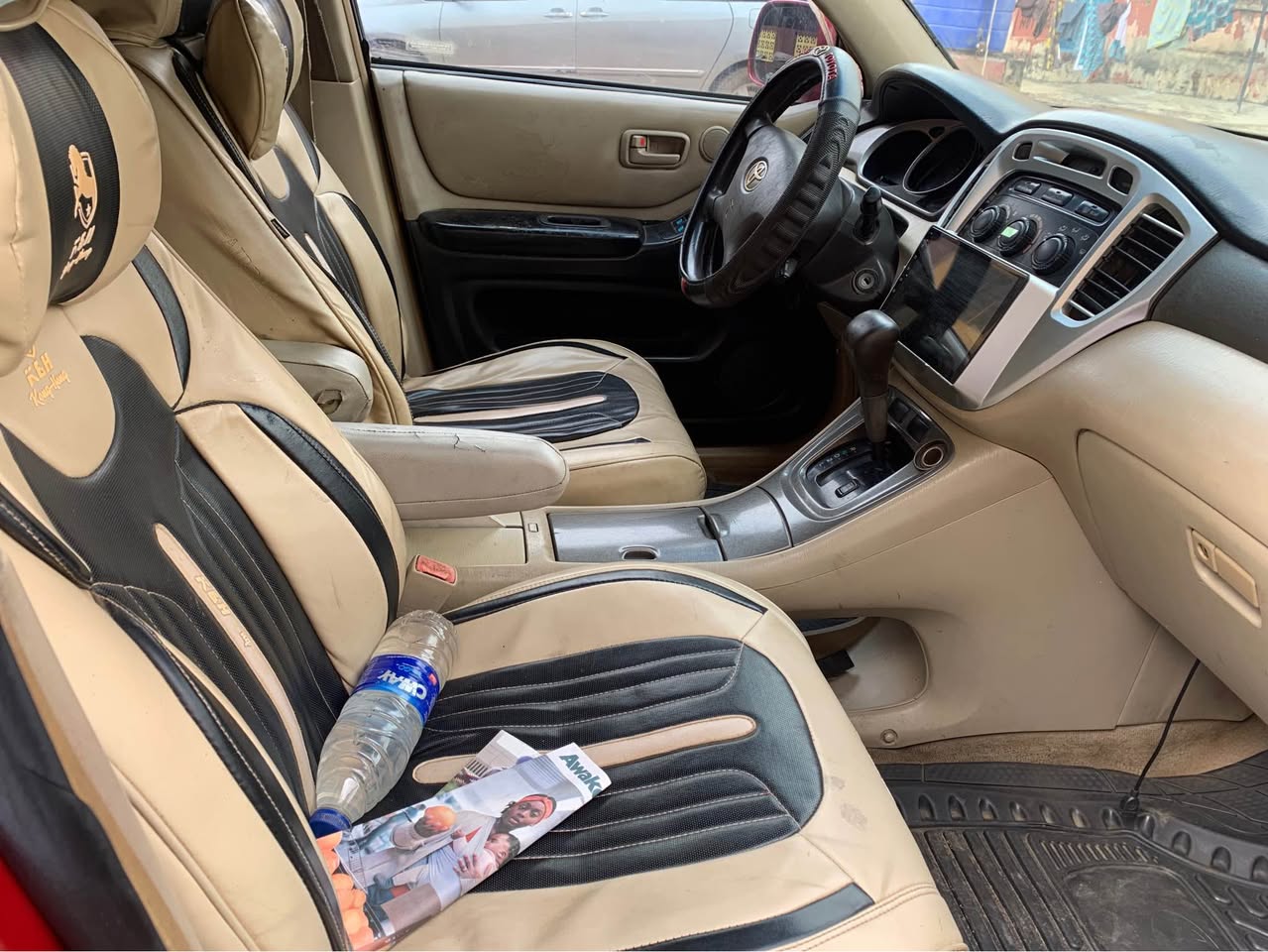 A picture of NIGERIA USED TOYOTA HIGHLANDER 03 GEAR AND ENGINE AC NEEDS