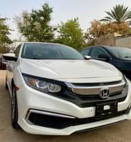A picture of Honda civic 2019 2 weeks used still smells tokumbo 16
