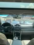 A picture of Toyota Camry 2014 Toks Standard Full option sun proof.