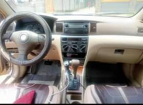 A picture of 2004 Corolla Engine and gear very sound Ac working Body
