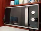 A picture of NJOO UJIOKOTEE MICROWAVE KUTOKA UK KWA BEI RAHISI 150000 TUPIGIE