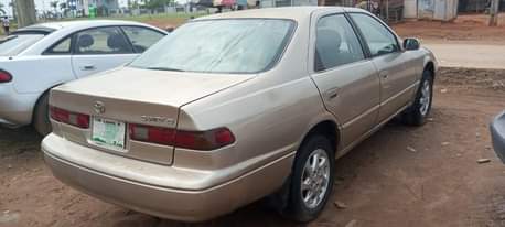 A picture of Clean Nigerian Used Toyota Camry tiny light Fabric interior Sound