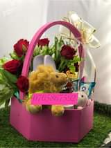 A picture of Flower bouquets and money Hampers