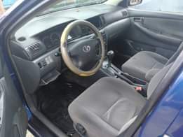 A picture of Distress Distress Auto drive Toyota Corolla bank type 2003 model