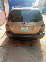 A picture of Toyota highlander 2004 2 rows Painted Engine gear and ac