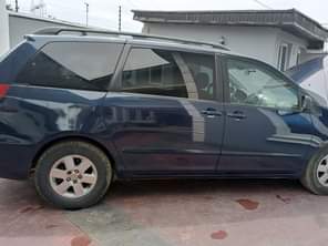 A picture of DELAY IS DANGEROUS TOKUNBO 2008 TOYOTA SIENNA First body pan